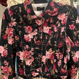 Driftwood corduroy jean jacket with floral print.